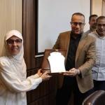 The Dean of the College of Medicine honors Ms. Mona Youssef Kamel, employee of Student Affairs, for reaching retirement age.