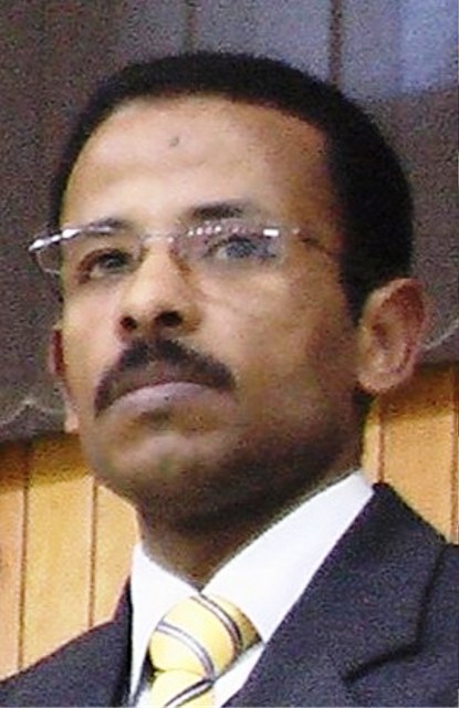 عز