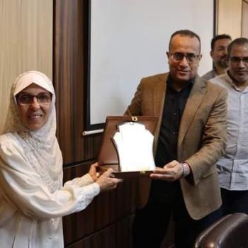 The Dean of the College of Medicine honors Ms. Mona Youssef Kamel, employee of Student Affairs, for reaching retirement age.